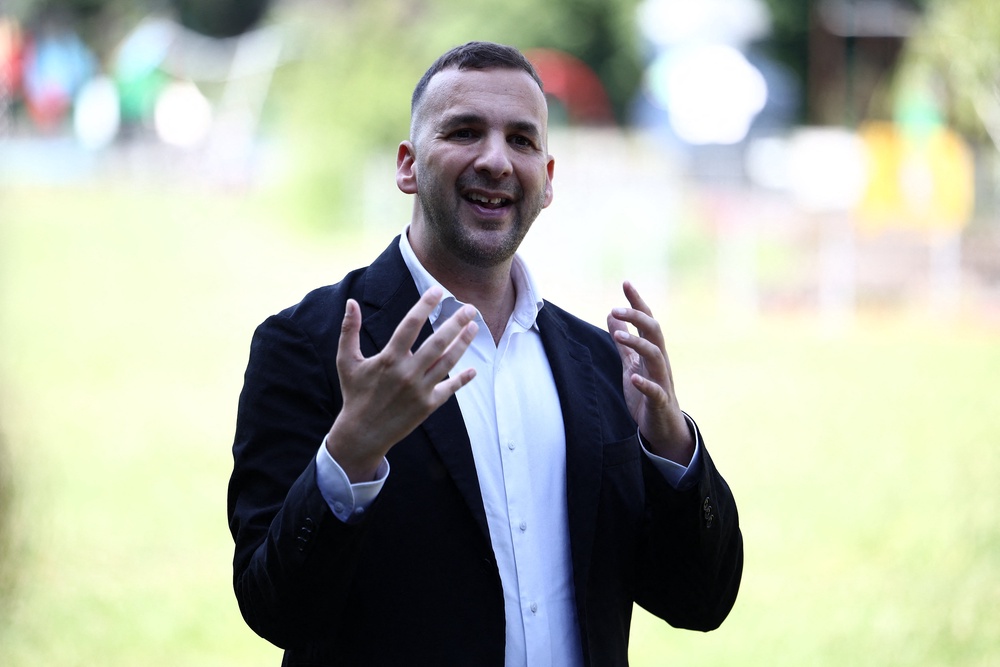 Britain's leader of the Green Party, Zack Polanski addresses supporters during a rally in south London (AFP/Getty)
