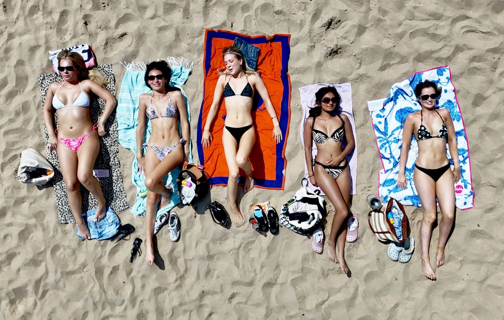 Sun bathing in 40C is best avoided (PA)