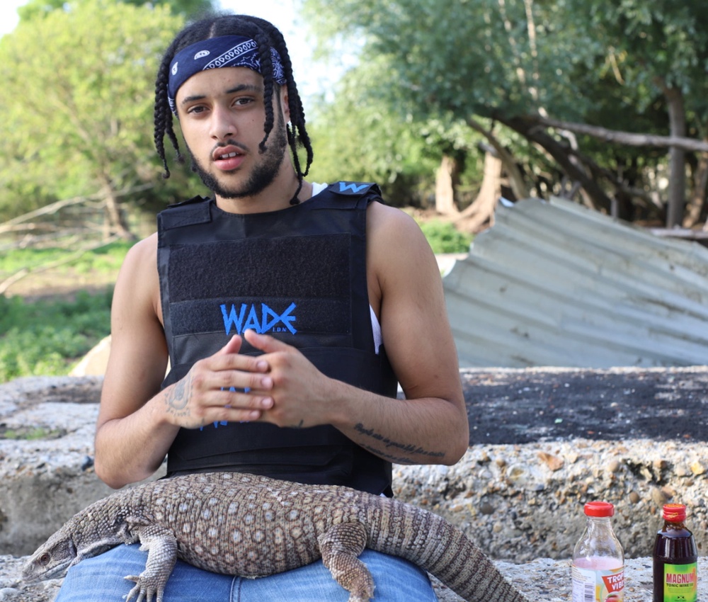 Ellis Heather with a Komodo dragon (Essex Police)