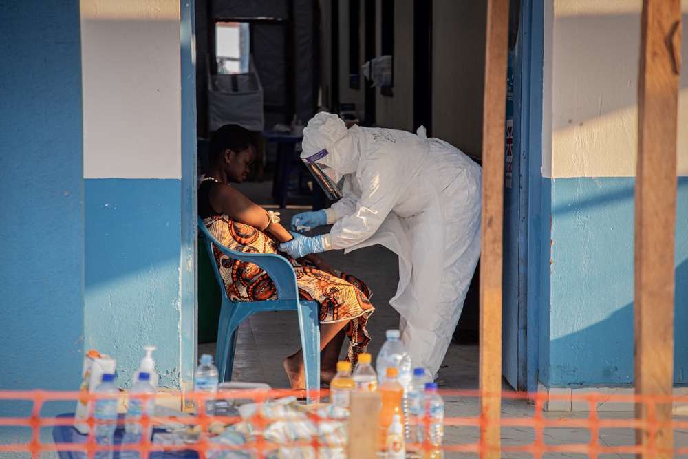 A healthcare worker at a medical centre in Bunia, DRC, on 23 June (AFP/Getty)