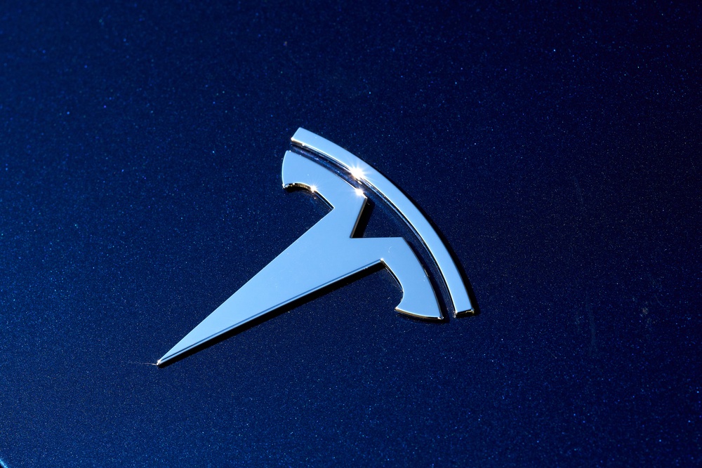 The Tesla logo on a electric vehicle in London (John Walton/PA) (PA Archive)