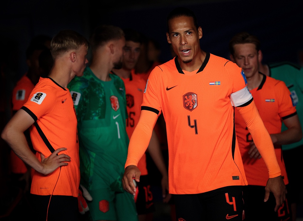 Virgil van Dijk (second-right) led the Dutch to a much better performance in their second outing (Getty)