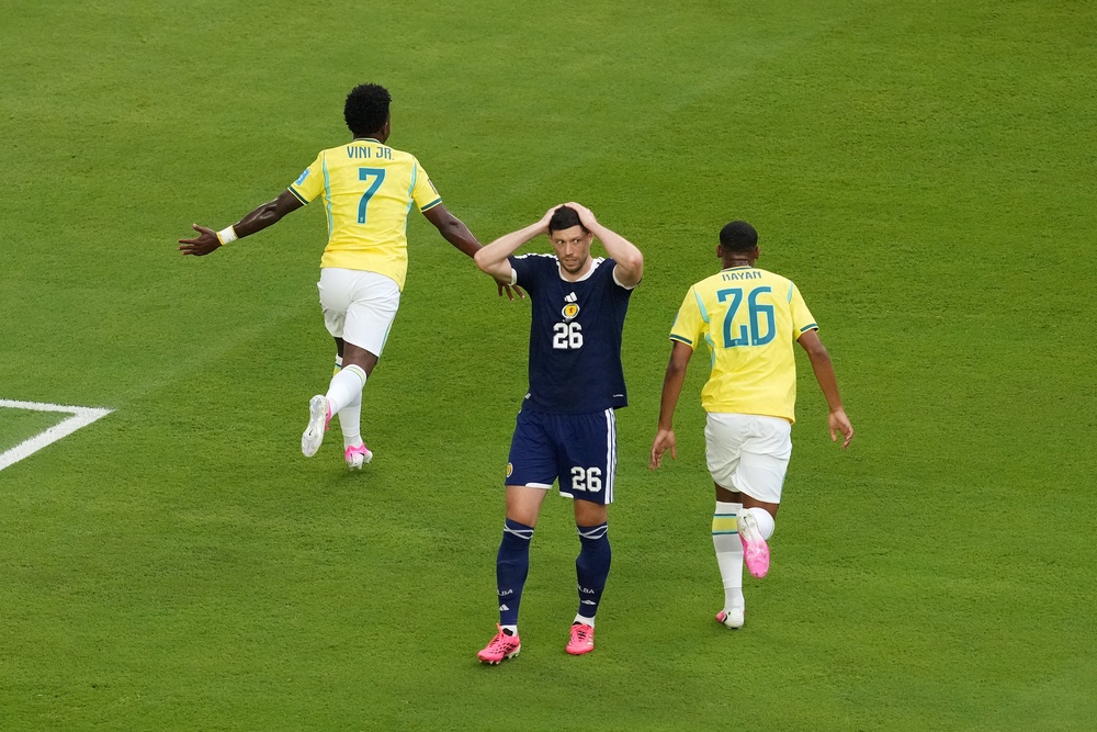 Scott McKenna was caught in possession leading to Brazil’s opening goal (PA)