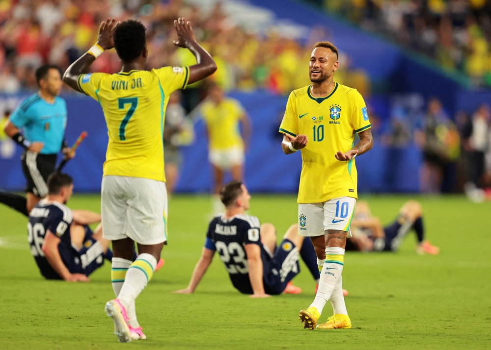 Neymar and Vinicius Jr celebrate against Scotland (Reuters)