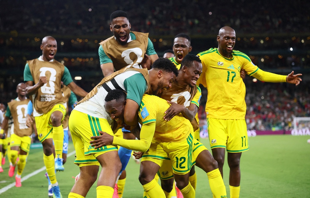 South Africa's Thapelo Maseko celebrates scoring their first goal with teammates (Reuters)