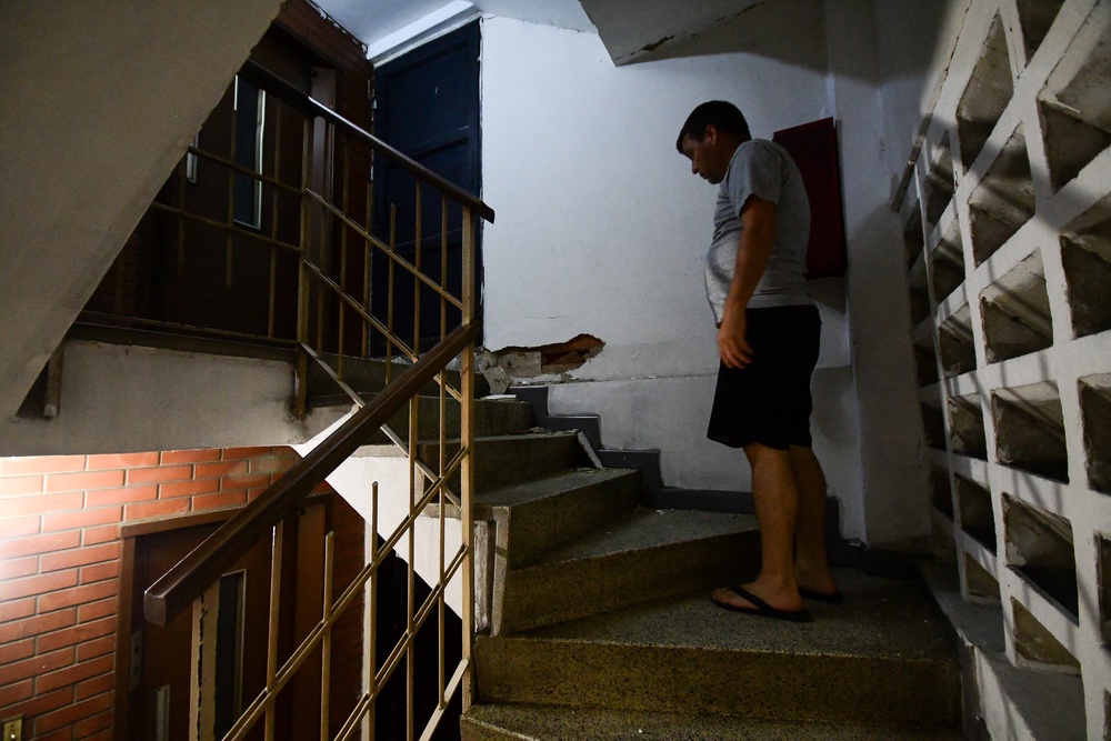 A man stands inside a damaged building following an earthquake in Valencia, Venezuela on 24 June 2026 (AFP/Getty)