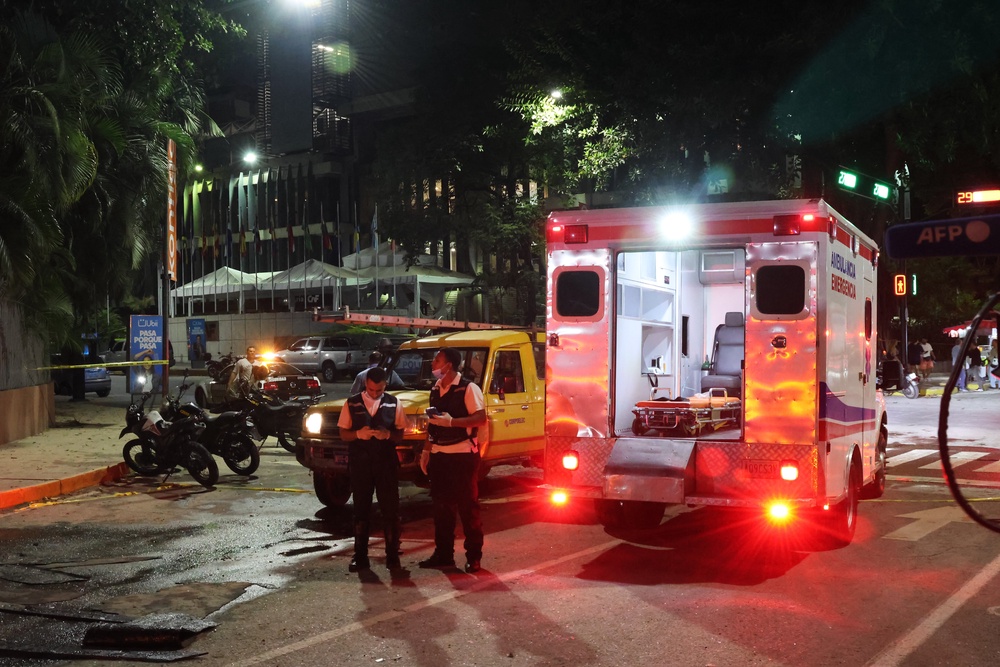 An ambulance outside a damaged building site in Los Palos Grandes after a magnitude 7.2 earthquake struck Venezuela (Getty)