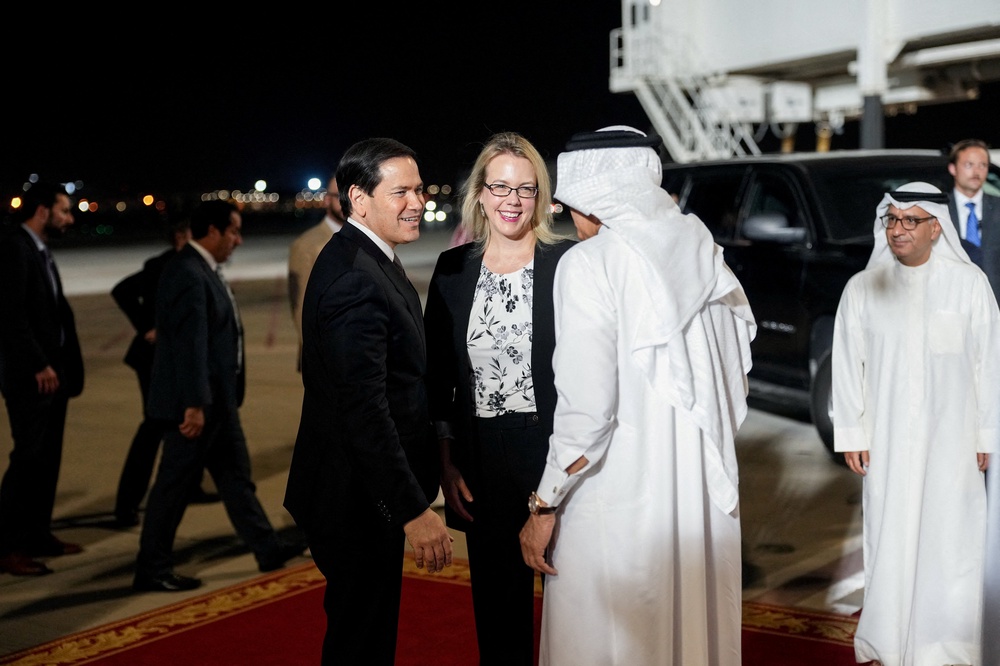 Bahrain's Foreign Minister Abdullatif bin Rashid Al Zayani and U.S. Ambassador to Bahrain Stephanie Hallett greeted the US secretary of state at Bahrain International Airport (Reuters)