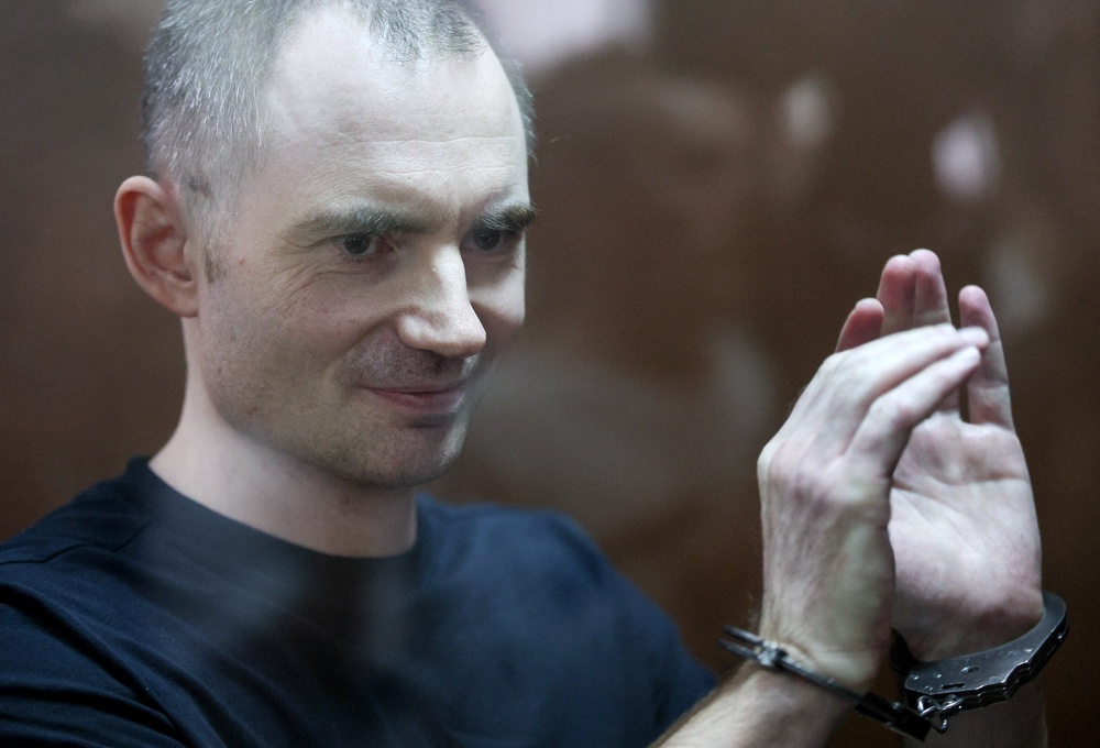 Russian opposition politician and deputy leader of the liberal Yabloko party, Maxim Kruglov, who was convicted of deliberately spreading false information about the Russian army during the conflict against Ukraine and jailed for seven years, leaves a courtroom after a hearing in Moscow (Reuters)