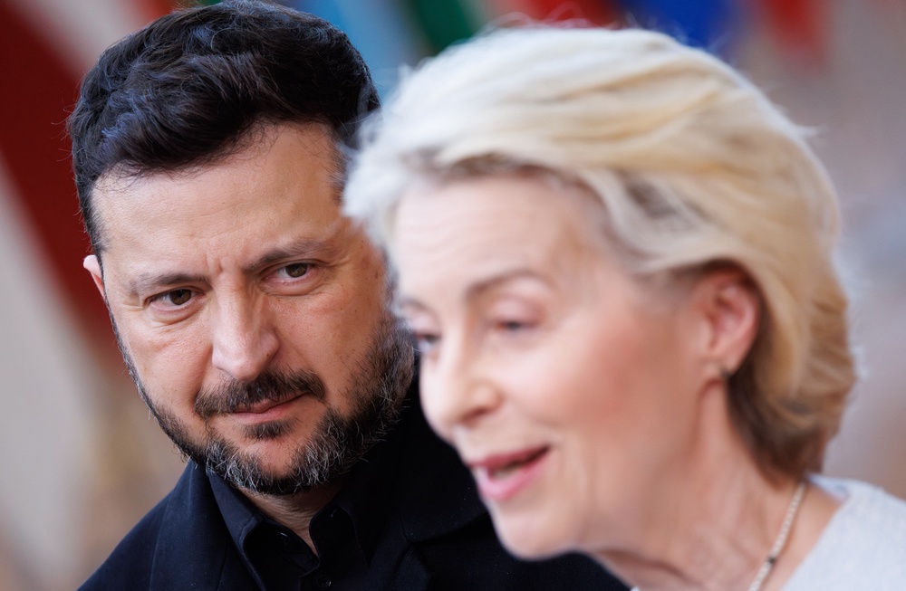 Ukraine’s president Volodymyr Zelensky looks on as European Commission president Ursula von der Leyen delivers remarks to journalists upon arrival at the EU Summit in Brussels earlier this month (AFP/Getty)