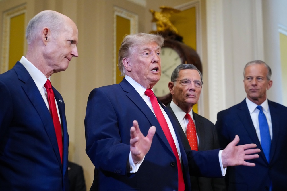 Donald Trump speaks to the media on Wednesday, flanked by Senate Republican leadership (Getty)