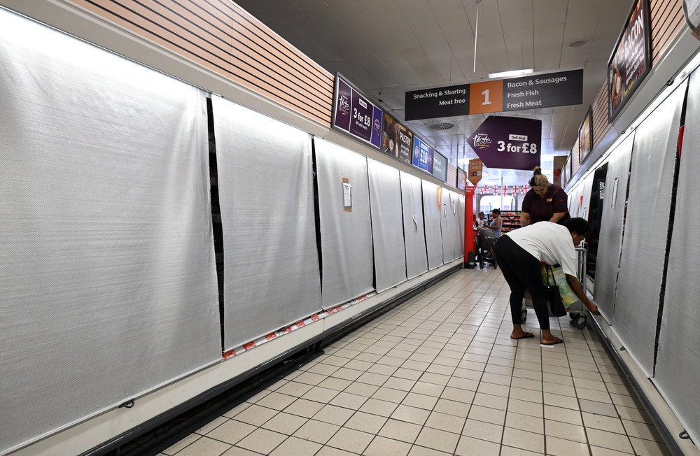 Shops were forced to cover fridges to keep items cool during the heat (AFP/Getty)
