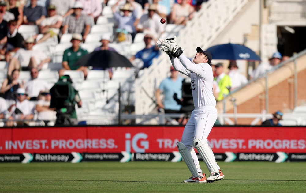 Jamie Smith shelled a great chance but did catch Rachin Ravindra late on (Reuters)