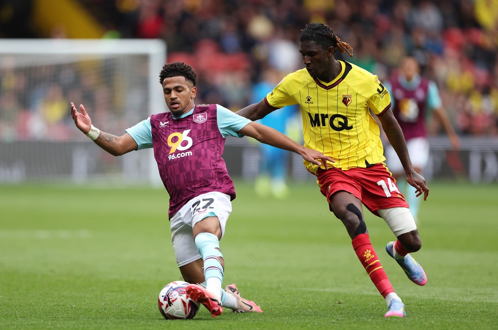 Dwomoh (right) was banned for 11 matches  in June for racially abusing a team-mate (Getty)