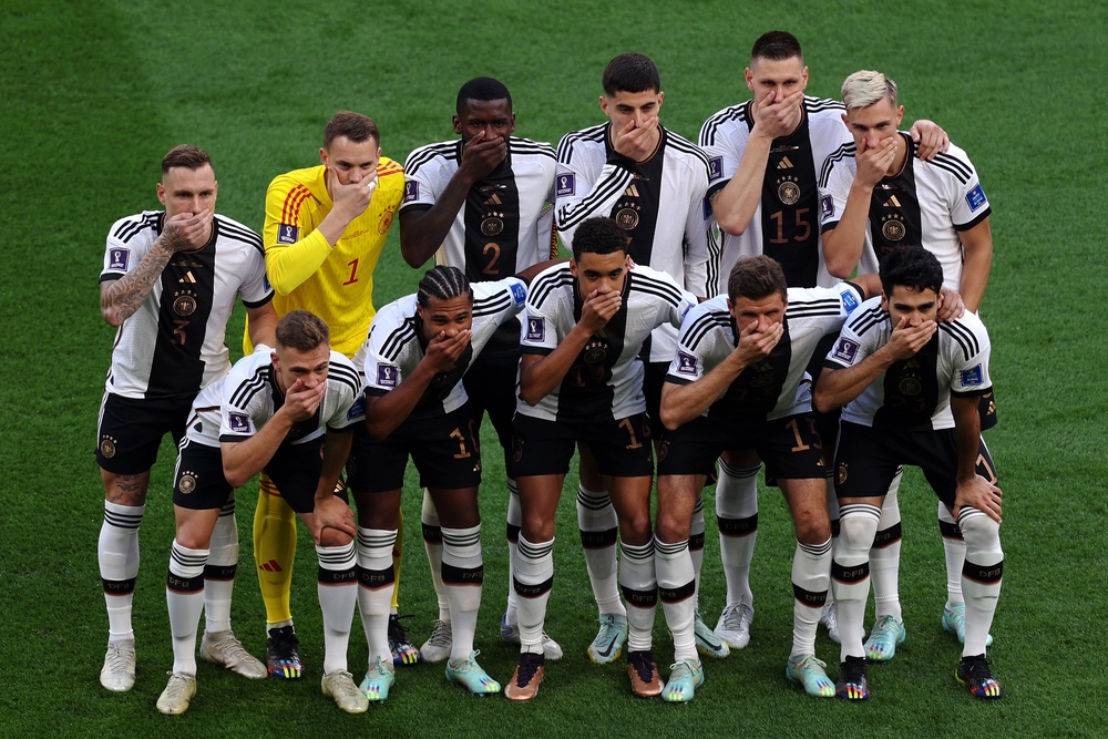 German players covered their mouths in protest at Fifa’s ‘political statement’ laws at the last World Cup in Qatar (Getty)