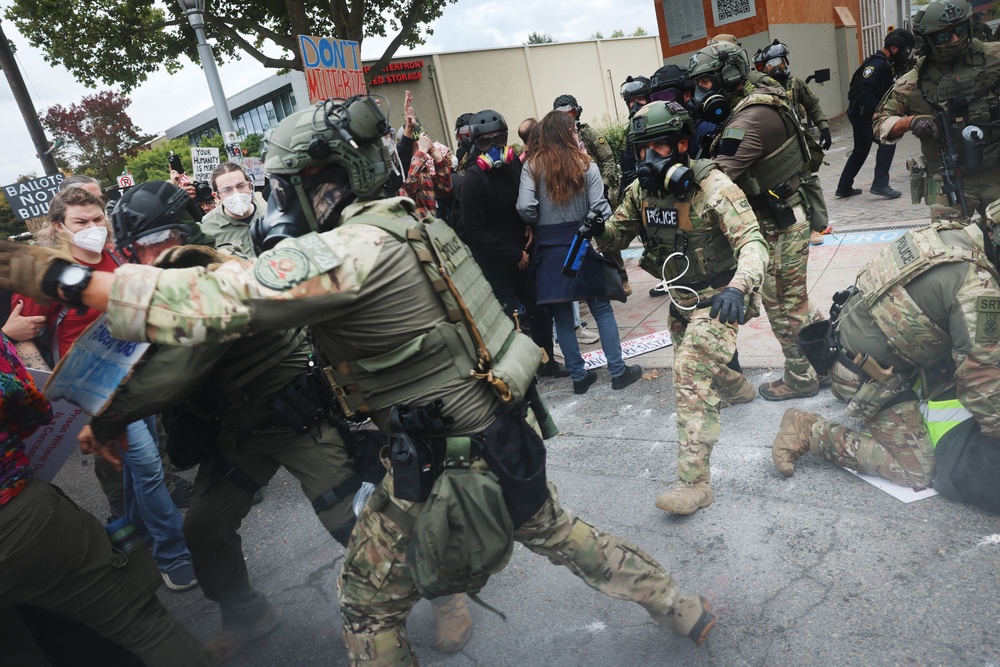 Anti-ICE protesters clash with police during a demonstration in Portland, Oregon, in October 2025. Lawmakers in some states, including Utah and Arizona, are already looking to crack down on protest-related crimes (Getty Images)
