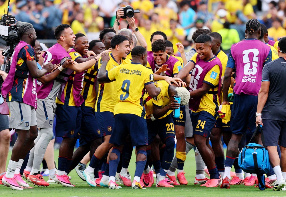 Ecuador's Nilson Angulo celebrates with teammates after the match (Reuters)