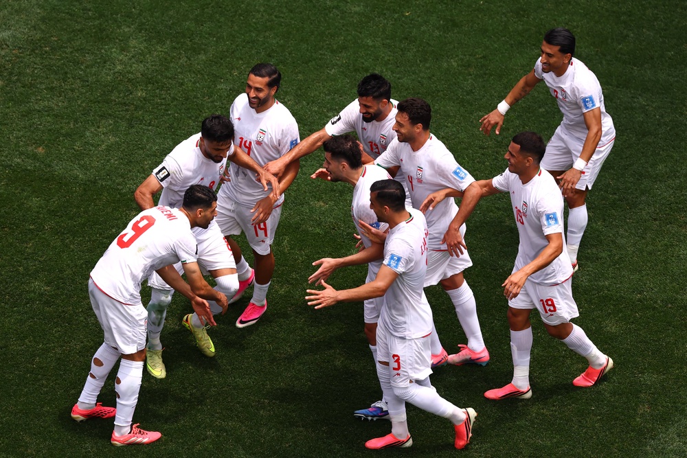 Mehdi Taremi #9 of Iran celebrates scoring a goal with teammates before it was disallowed due to offside during the FIFA World Cup 2026 Group G match between Belgium and IR Iran at Los Angeles Stadium on June 21 (Getty)