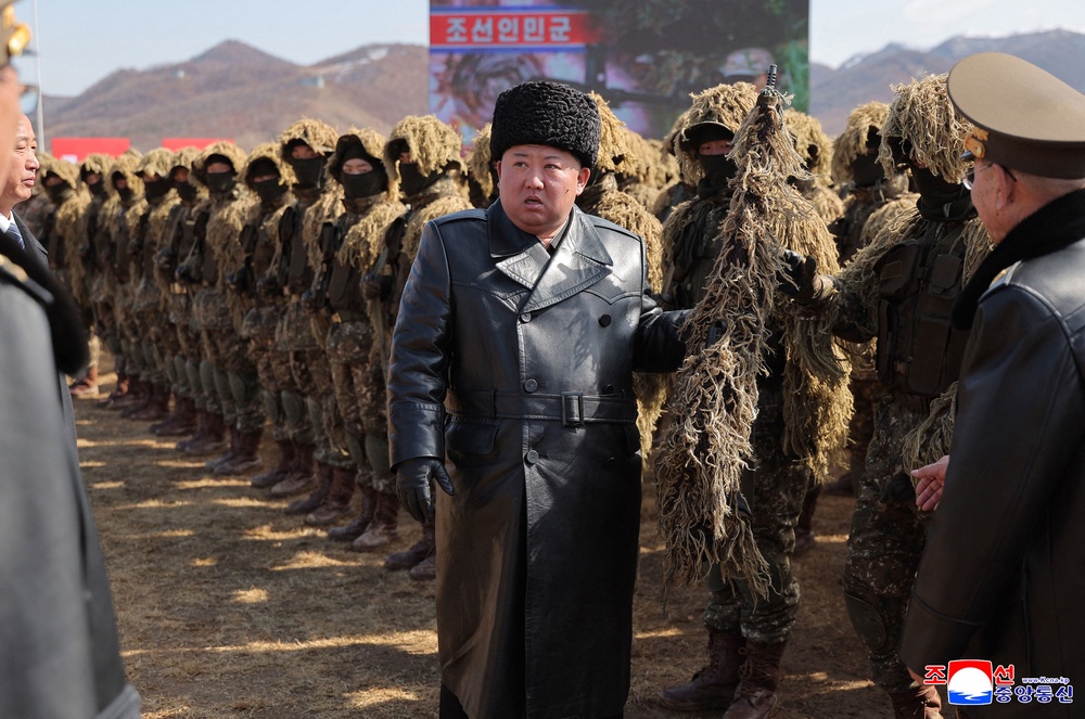 Kim Jong Un inspects a shooting competition (AFP via Getty)