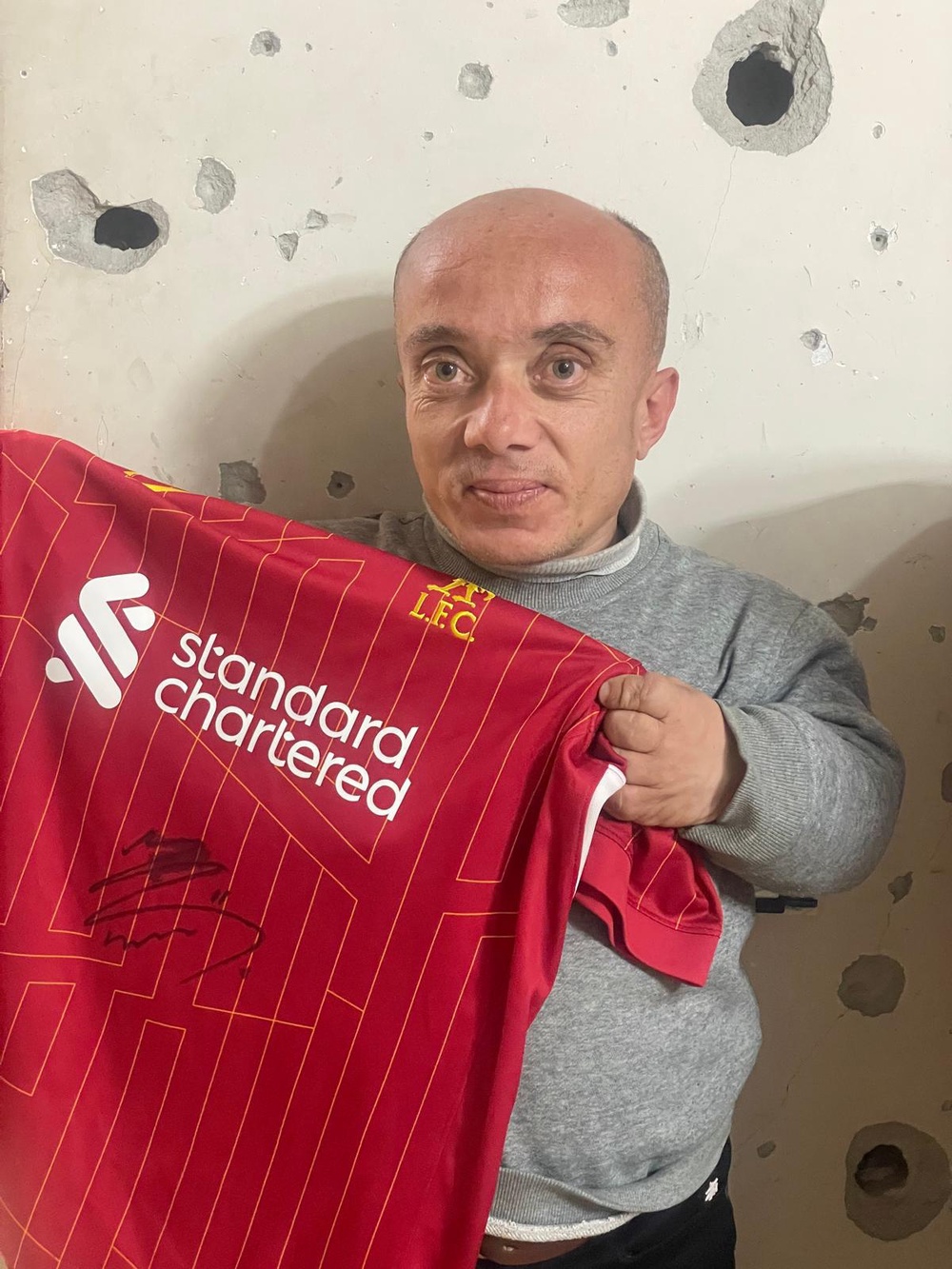 Haitham was gifted a signed t-shirt by Liverpool star Mohammed Salah (Haitham Al-Saqqa)