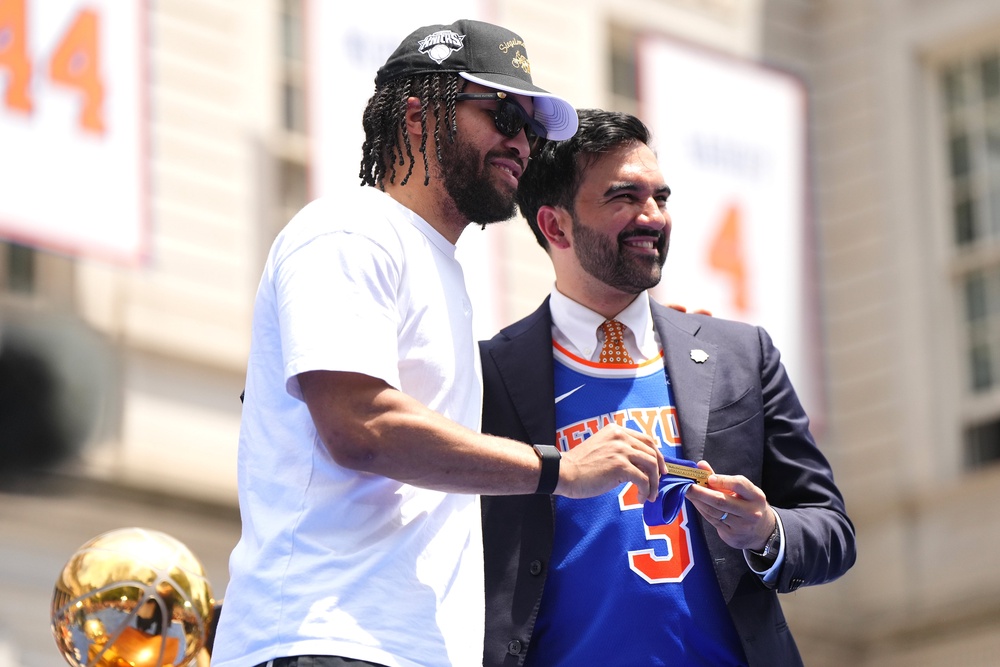 The Knicks’ victory sparked massive celebrations throughout the city. Pictured: Brunson receives the Keys of the City from New York City Mayor Zohran Mamdani on June 18 (Getty Images)