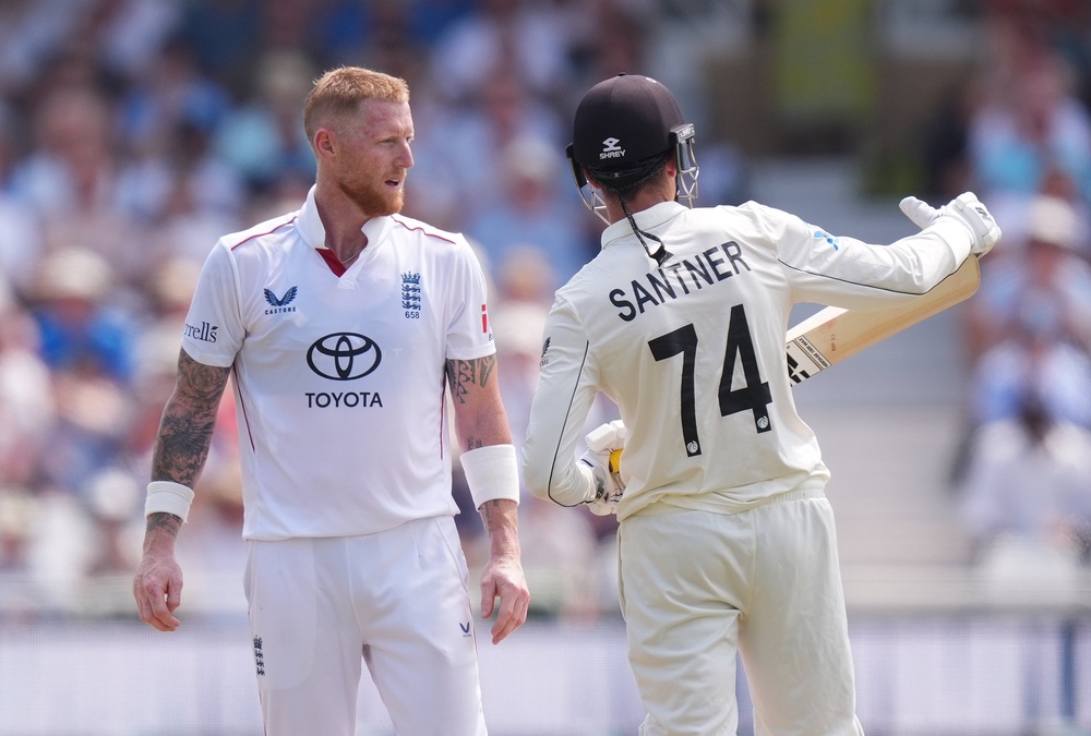 Mitch Santner discusses his dismissal with Ben Stokes (Mike Egerton/PA) (PA Wire)