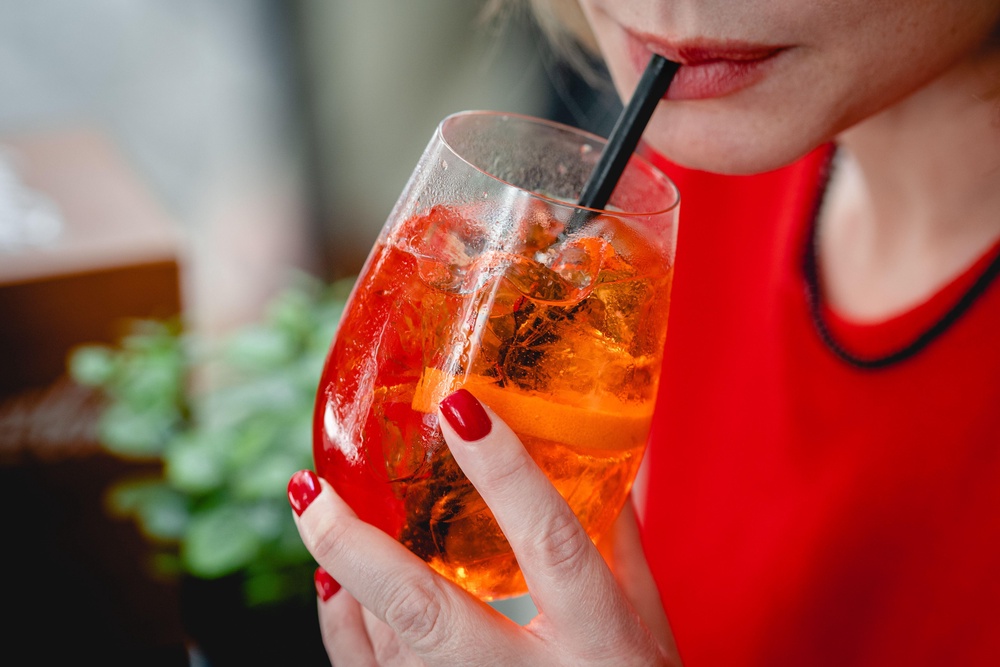 Alcohol is a diuretic, and diuretics help relieve the body of fluid.
