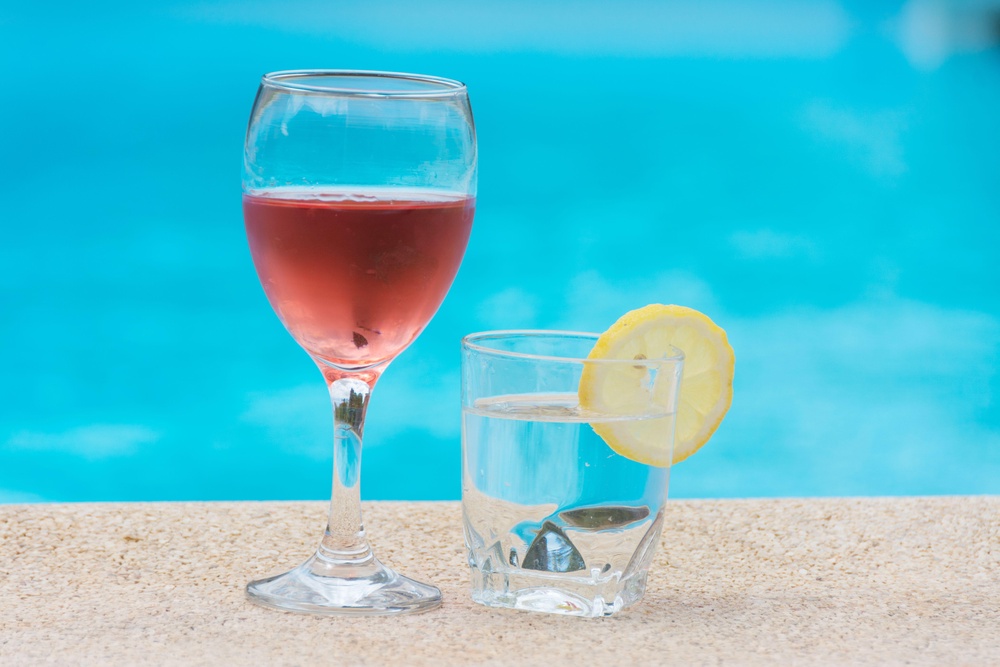 Drink a soft drink or water inbetween alcoholic drinks.