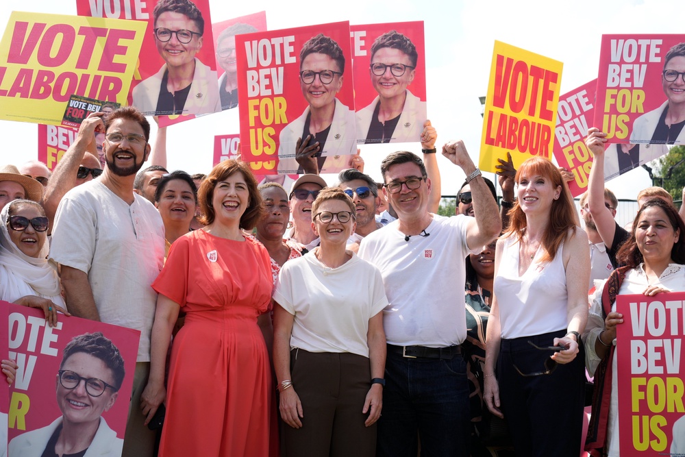 Burnham with Lucy Powell and Angela Rayner at Bev Craig’s campaign launch last month (PA)