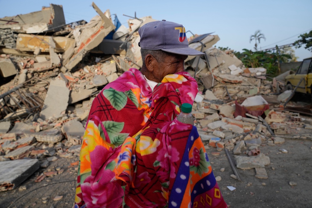 A man stands in front of a collapsed building two days after an earthquake struck La Guaira, Venezuela, Friday, June 26, 2026. (AP)