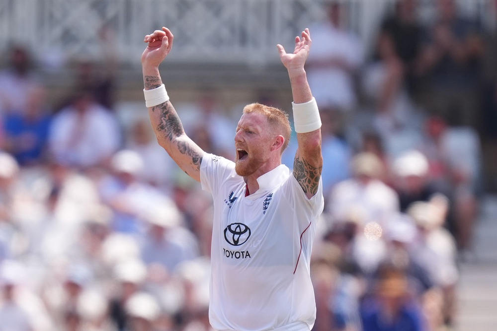 England’s Ben Stokes celebrates taking the wicket of New Zealand’s Mitch Santner (PA Wire)