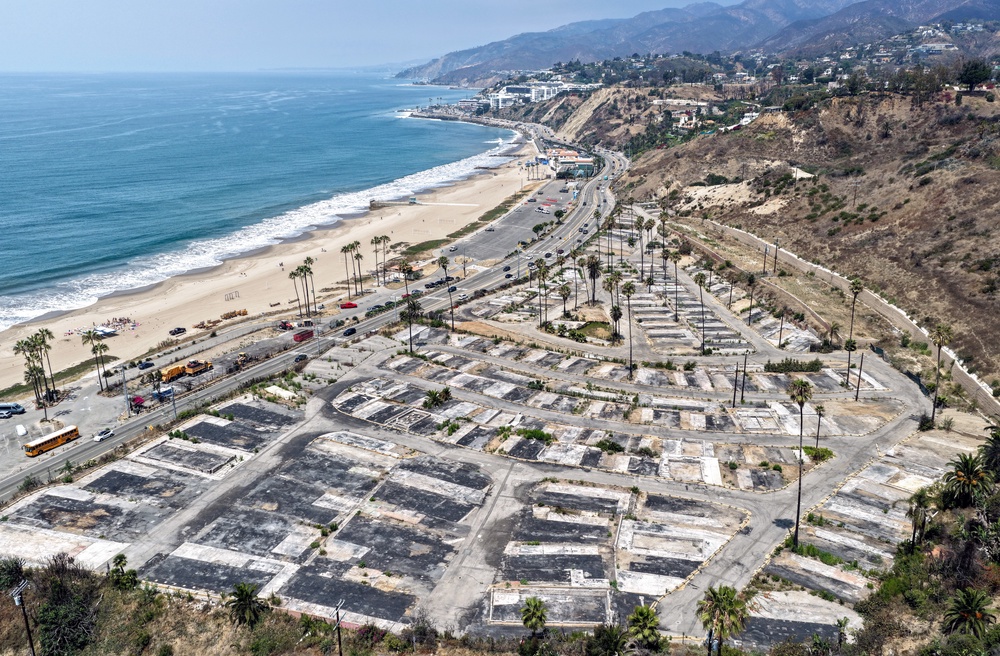 The Palisades Fire began Jan. 7 and burned through the hillside neighborhoods of Pacific Palisades and Malibu, killing 12 people (Getty)