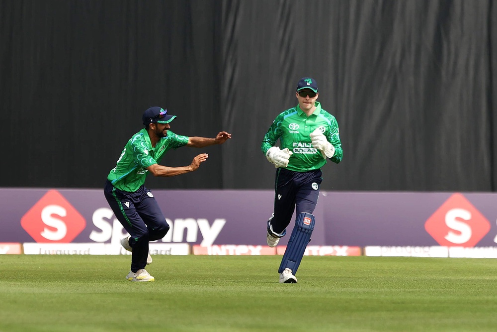 Ireland’s Lorcan Tucker, right, celebrates after catching out India’s Ishan Kishan off the bowling of Matt Hollard (Liam McBurney/PA). (PA Wire)