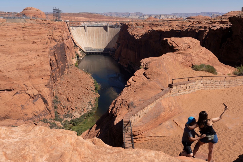 Lake Powell was created in the 1960s with the completion of the Glen Canyon Dam. The dam is the second-tallest concrete-arch in the U.S. (Getty Images)