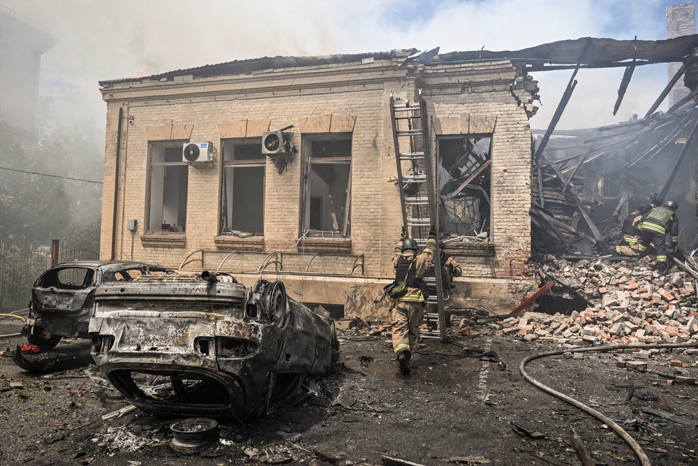 Firefighters work at the site of a Russian military strike, amid Russia's attack on Ukraine (Reuters)