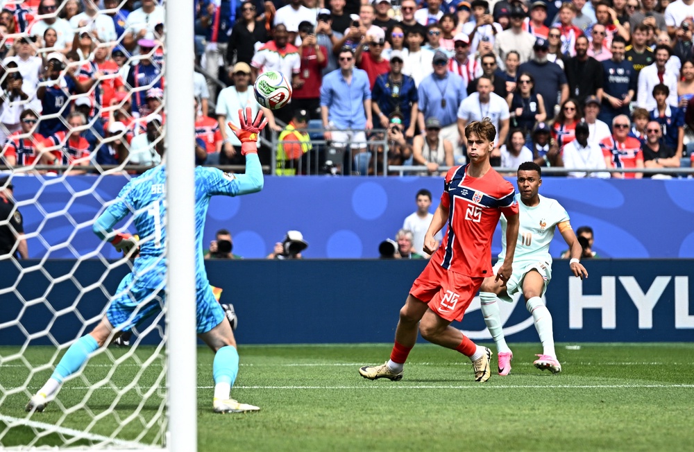 Kylian Mbappe strikes the crossbar in the first minute (Reuters)