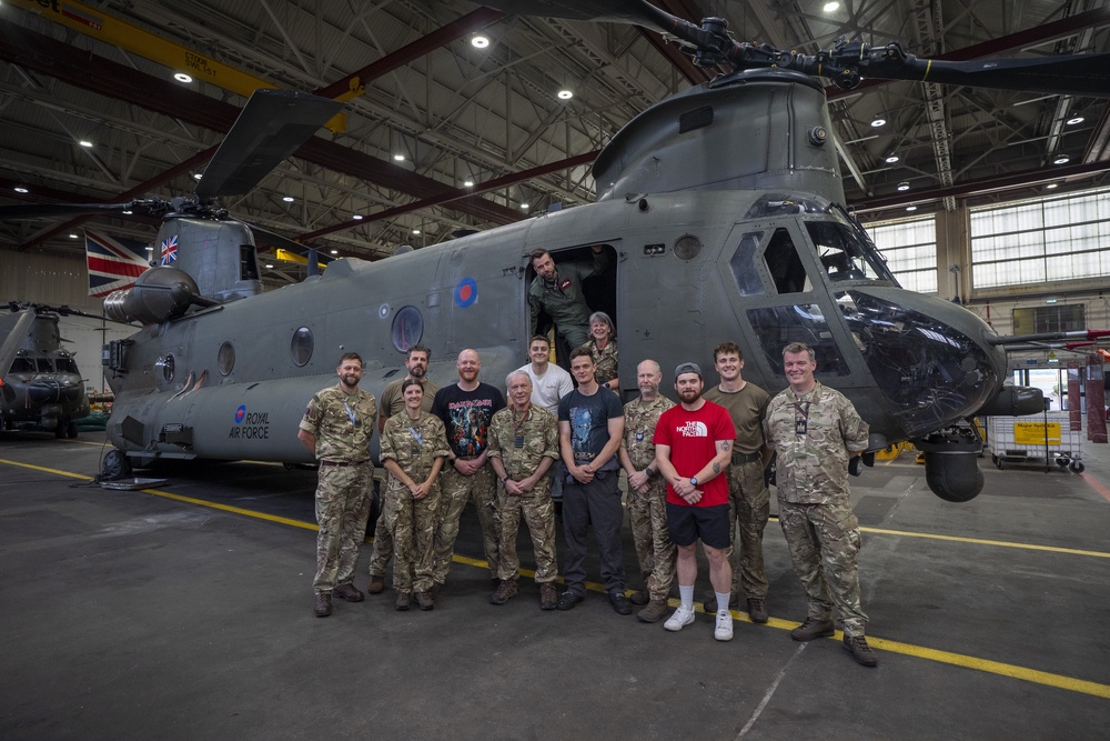 Bruce Dickinson poses with crew of an RAF Chinook (Ben Birchall/PA) (PA Wire)