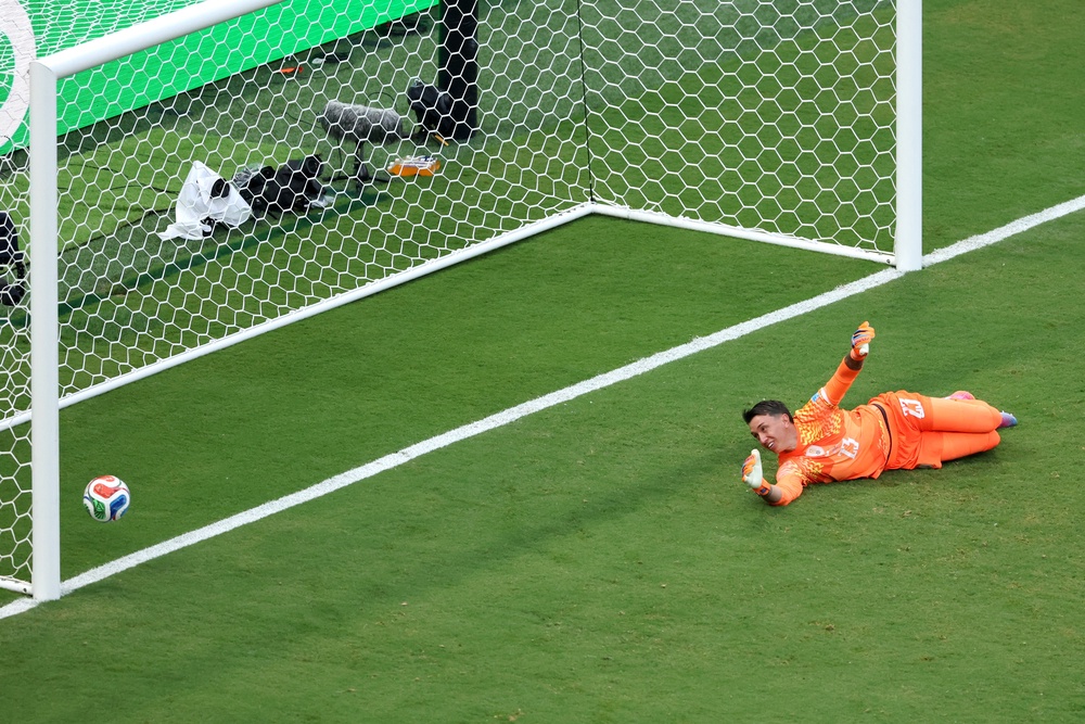 Fernando Muslera bundles the ball into his own net (Getty)
