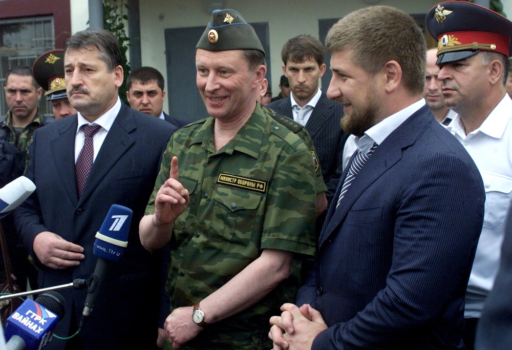 File: Russian Defence Minister Sergei Ivanov (C) speaks to the media as Chechen President Alu Alkhanov (L) and Prime Minister Ramzan Kadyrov (2nd R) listen in Khankala near Grozny July 11, 2006. (Reuters)
