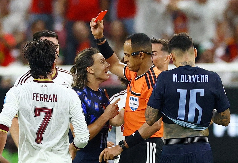 Agustin Canobbiowas sent off as frustration boiled over for Uruguay (Reuters)