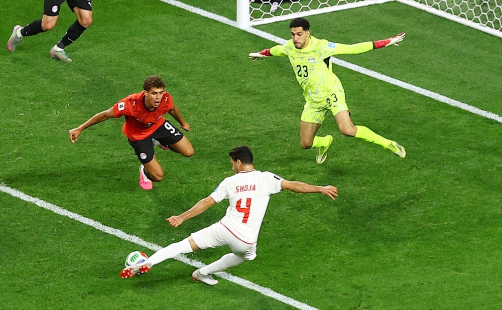 Khalilzadeh's stoppage-time strike looked to have clinched second place for Iran (Reuters)
