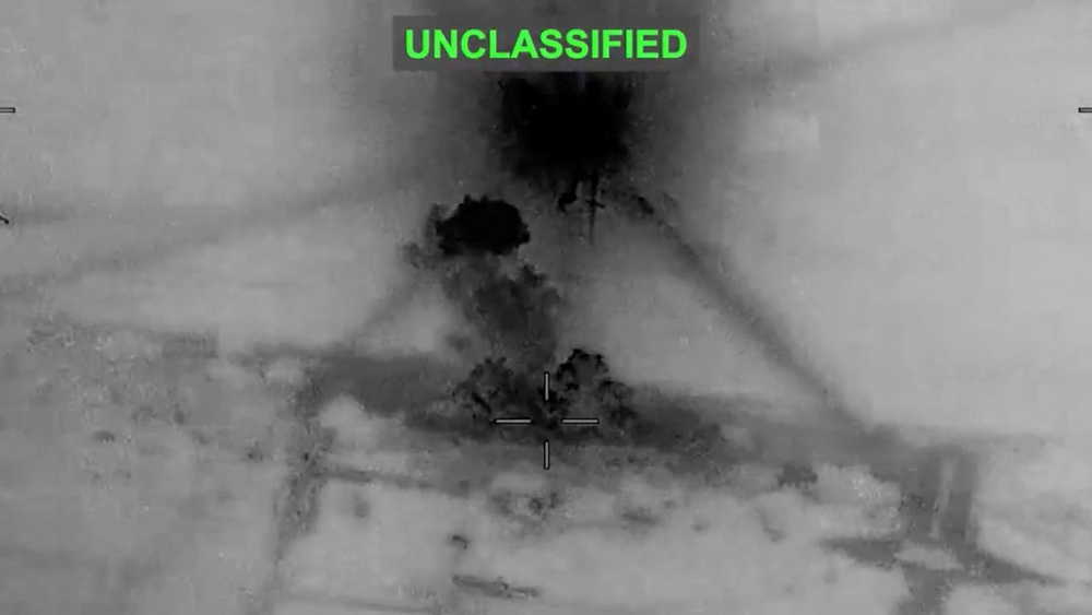 Smoke rises from explosions at an unknown location, following what U.S. Central Command (CENTCOM) said were strikes on Iran in response to an Iranian drone strike on a cargo ship (Reuters)