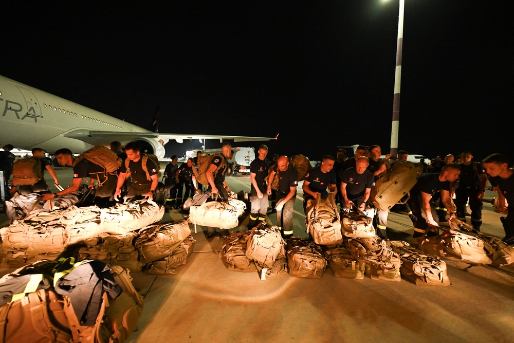French officers of the 7th Civil Security Training and Response Regiment prepare their shipment before flying to Venezuela to provide help, at the Marseille Provence airport in Marignane, southern France, on 27 June 2026 (Reuters)