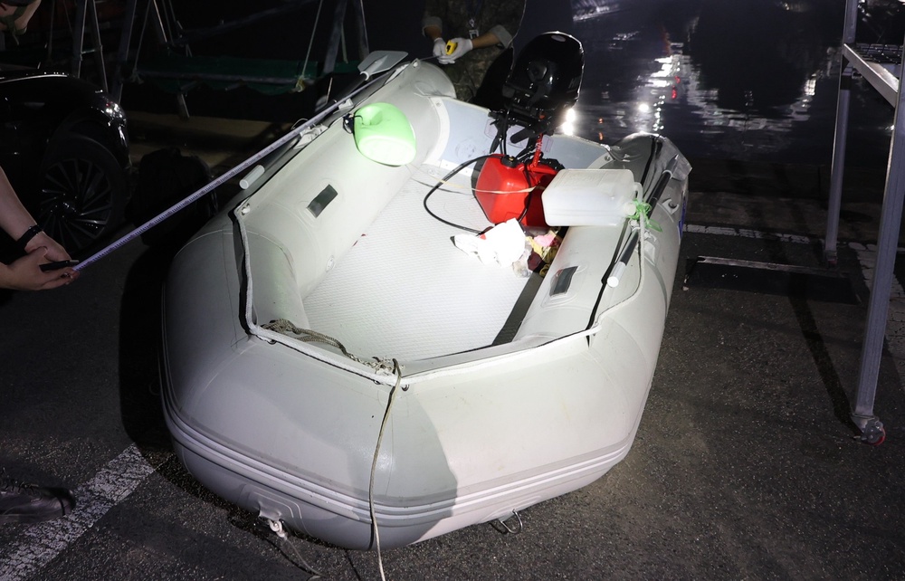 This photo provided by The Taean Maritime Police, shows the rubber boat that a Dong Guangpinghad boarded when he was detained in the waters off South Korea's west coast, at a port in Taean, South Korea