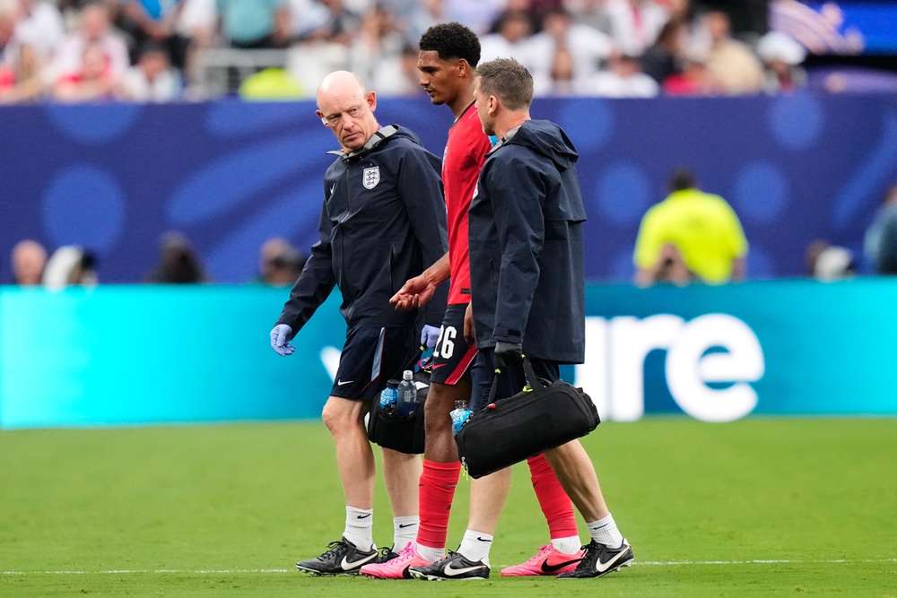 Jarell Quansah was led off by medics after suffering an injury against Panama (AP)