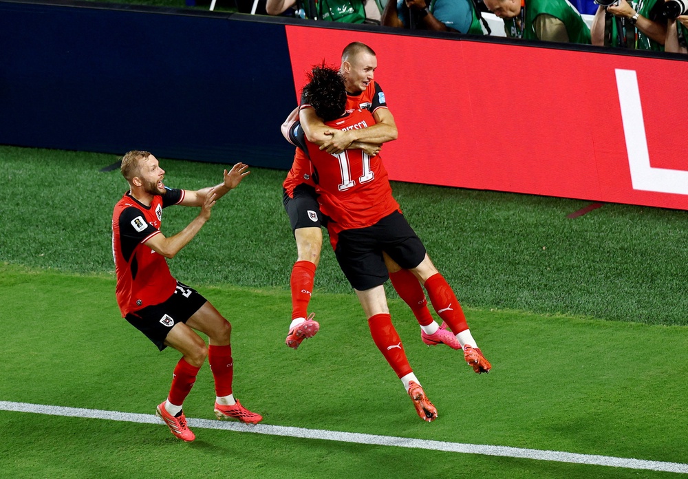 Image from: Spain vs Austria LIVE: Oyarzabal brace eases European champions through World Cup last 32