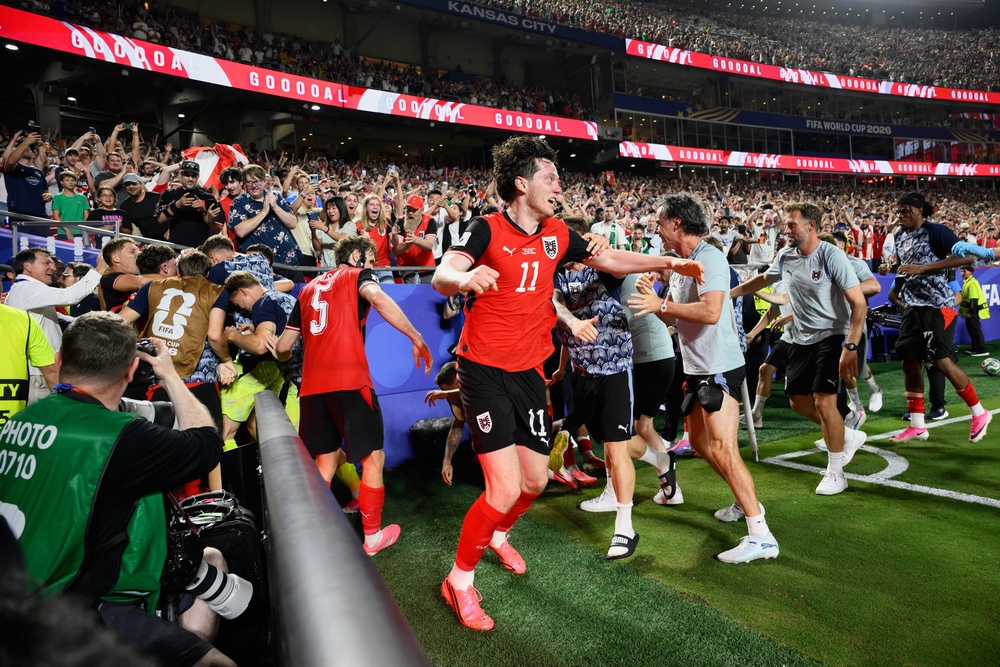 Austria and Algeria played out an entertainingly chaotic end to the group stage (AP)