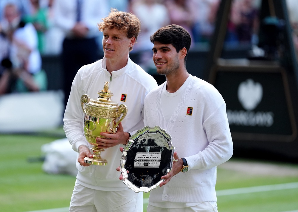 Carlos Alcaraz (right) is not playing at Wimbledon this year because of injury (John Walton/PA) (PA Archive)