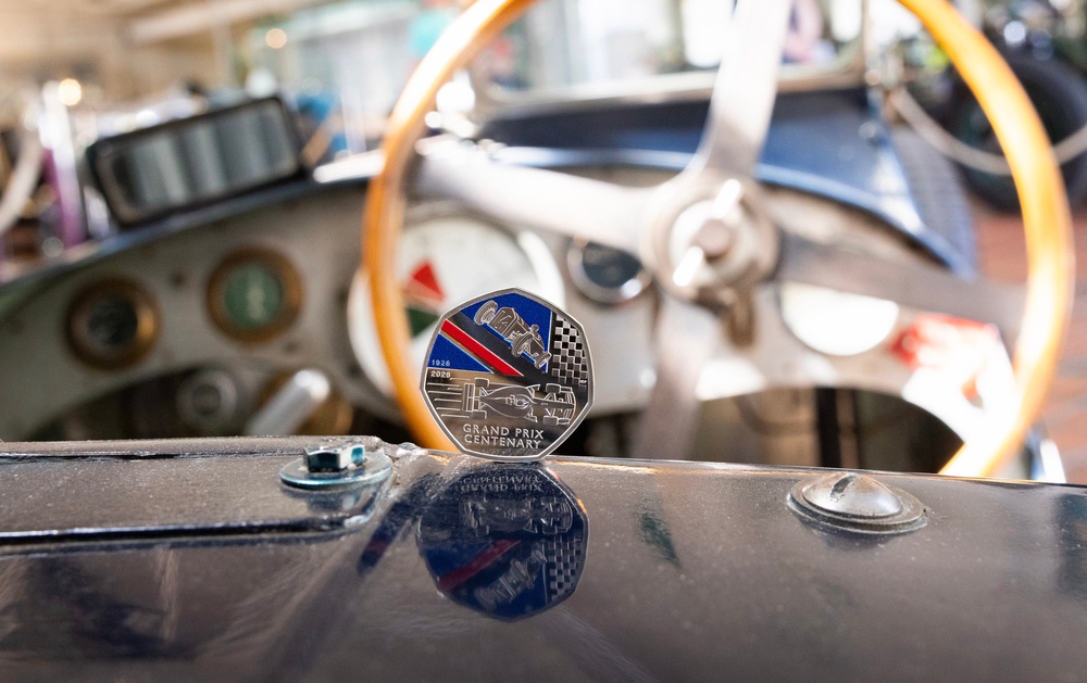 The coin was unveiled at Brooklands in Weybridge, Surrey, the venue that hosted Britain’s first Grand Prix in August 1926, and was pictured alongside a Delage car (PA)