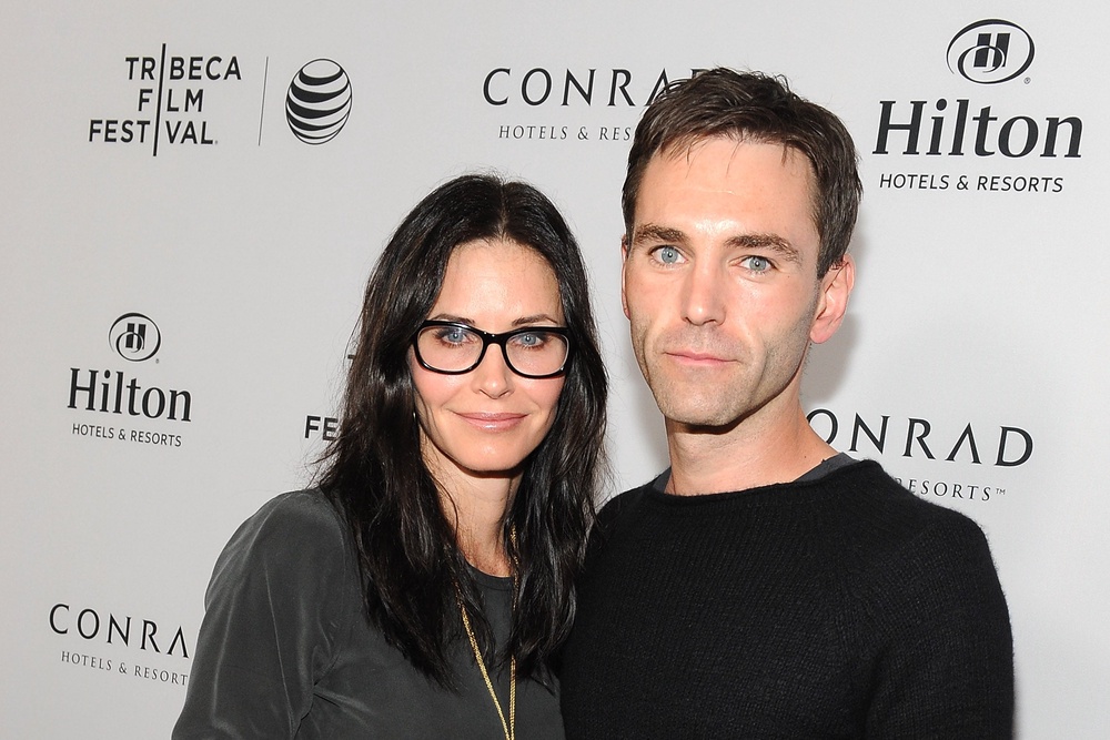 Courteney Cox and recording artist Johnny McDaid back in 2014 (Getty)